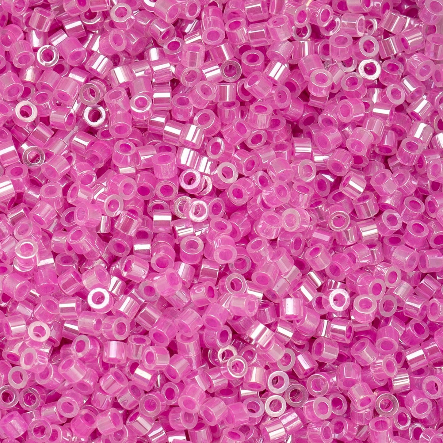 Cylin Beads 11/O Crystal Fuchsia Lined Ceylon  25g Bag, 1033