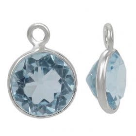 Sterling Silver stone charm with blue topaz.